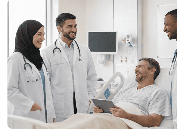 A team of surgeons performing an operation under surgical lights